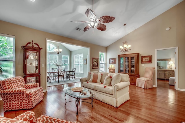 24 Willowbend Dr, Murrells Inlet, SC 29576 - living room featuring a chandelier, light wood-type flooring, ceiling fan, baseboards, and high vaulted ceiling