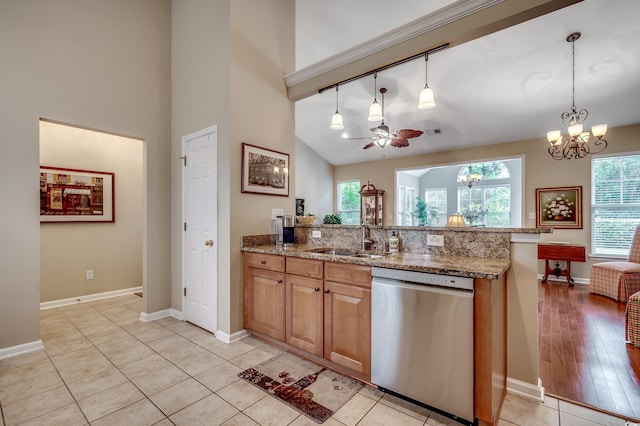 24 Willowbend Dr, Murrells Inlet, SC 29576 - kitchen featuring stainless steel dishwasher, a sink, a chandelier, light stone counters, and high vaulted ceiling