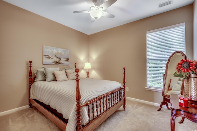 24 Willowbend Dr, Murrells Inlet, SC 29576 - carpeted bedroom with baseboards and a ceiling fan