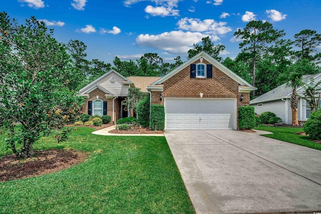 24 Willowbend Dr, Murrells Inlet, SC 29576 - traditional-style house featuring brick siding, concrete driveway, a front lawn, and a garage