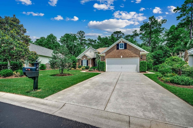 24 Willowbend Dr, Murrells Inlet, SC 29576 - view of front of property featuring brick siding, a front lawn, and driveway