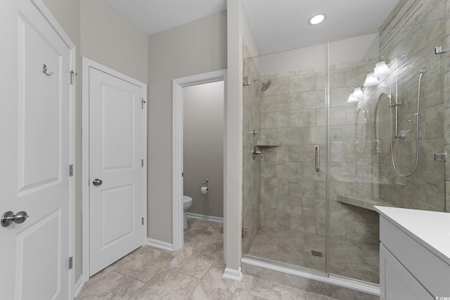 281 Lumbee Cir, Pawleys Island, SC 29585 - full bathroom with a shower stall, toilet, vanity, baseboards, and tile patterned floors