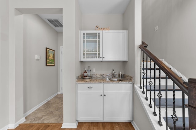 281 Lumbee Cir, Pawleys Island, SC 29585 - indoor wet bar featuring baseboards and stairs