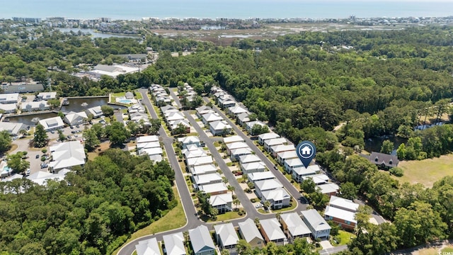281 Lumbee Cir, Pawleys Island, SC 29585 - aerial overview of property's location with a large body of water, nearby suburban area, and a heavily wooded area