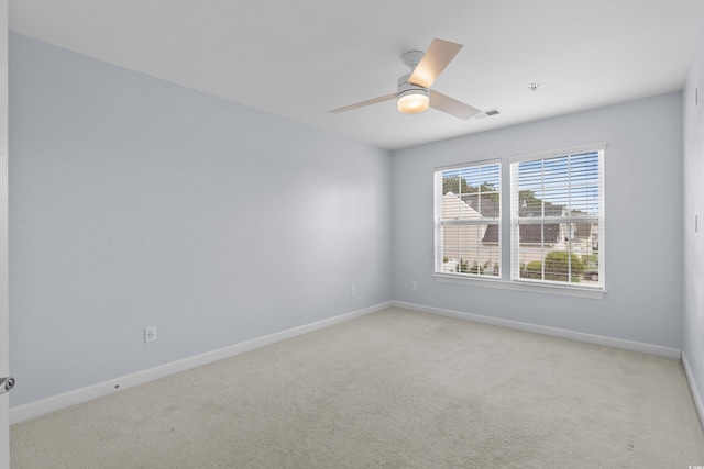 373 Skyland Pines Dr, Myrtle Beach, SC 29588 - spare room with light colored carpet, baseboards, and a ceiling fan