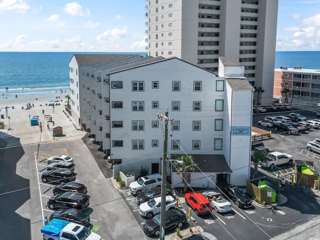 920 N Waccamaw Dr Unit 1302, Garden City Beach, SC 29576 - view of apartment building / complex featuring a water view and uncovered parking