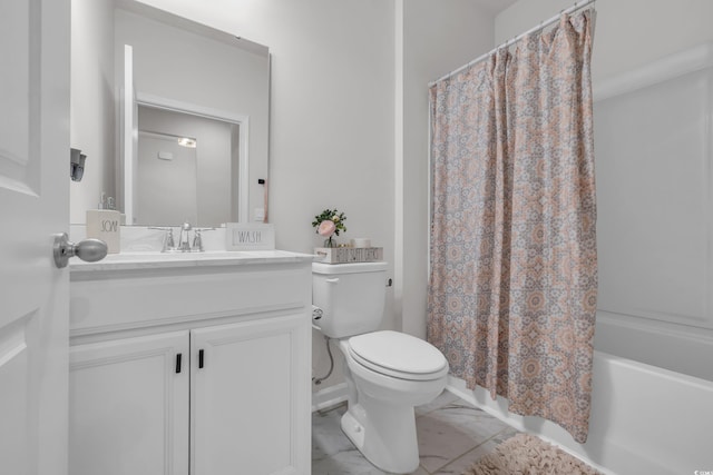 553 Pier Ct, Little River, SC 29566 - full bathroom with marble look tiles, toilet, vanity, and shower / tub combo with curtain