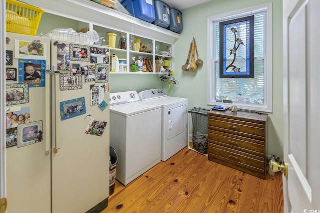 3926 Flagg St, Murrells Inlet, SC 29576 - laundry area featuring washing machine and clothes dryer and wood finished floors