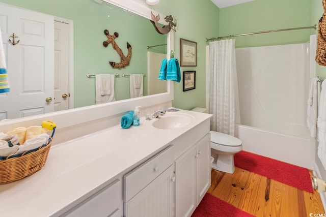 3926 Flagg St, Murrells Inlet, SC 29576 - bathroom featuring vanity, wood finished floors, shower / bath combo with shower curtain, and toilet
