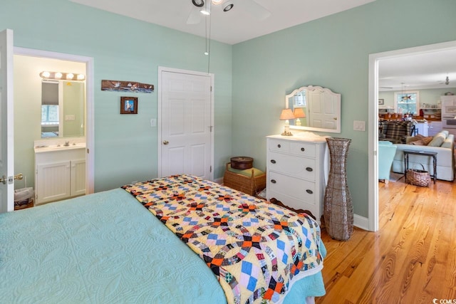 3926 Flagg St, Murrells Inlet, SC 29576 - bedroom with light wood-type flooring, ensuite bath, and ceiling fan