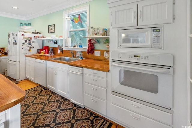 3926 Flagg St, Murrells Inlet, SC 29576 - kitchen featuring white appliances, a sink, wooden counters, open shelves, and crown molding