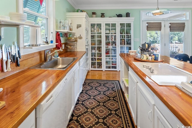 3926 Flagg St, Murrells Inlet, SC 29576 - kitchen featuring butcher block countertops, white dishwasher, a sink, white cabinetry, and ornamental molding
