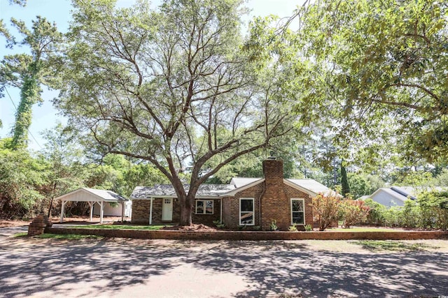 4271 Mclamb Ave, Little River, SC 29566 - ranch-style home with a chimney and brick siding