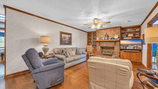 412 Carolina Dr, Loris, SC 29569 - living room featuring a ceiling fan, wood finished floors, ornamental molding, and built in features
