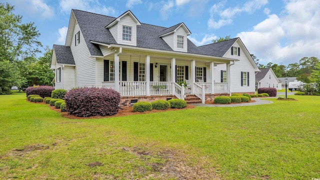 412 Carolina Dr, Loris, SC 29569 - cape cod house with roof with shingles, a porch, a front yard, and crawl space