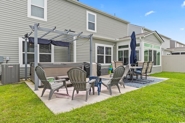 4927 Sandlewood Dr, Myrtle Beach, SC 29579 - back of house featuring a hot tub, central AC unit, a pergola, and a patio area