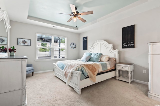 4927 Sandlewood Dr, Myrtle Beach, SC 29579 - bedroom featuring light colored carpet, a raised ceiling, baseboards, and a ceiling fan