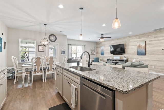 4927 Sandlewood Dr, Myrtle Beach, SC 29579 - kitchen featuring a sink, dishwasher, ceiling fan, a kitchen island with sink, and open floor plan
