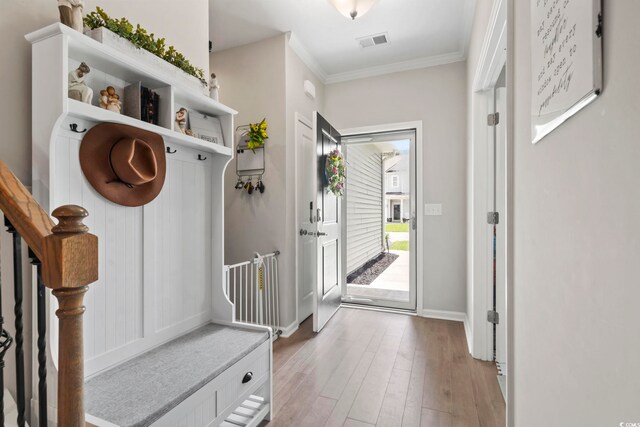 4927 Sandlewood Dr, Myrtle Beach, SC 29579 - mudroom with crown molding, light wood-style flooring, and baseboards