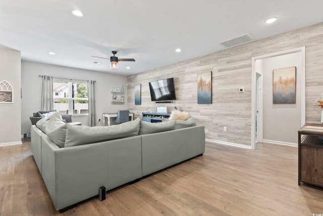 4927 Sandlewood Dr, Myrtle Beach, SC 29579 - living room featuring an accent wall, baseboards, ceiling fan, recessed lighting, and wood finished floors