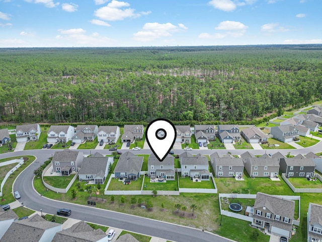 4927 Sandlewood Dr, Myrtle Beach, SC 29579 - aerial overview of property's location featuring a forest and nearby suburban area