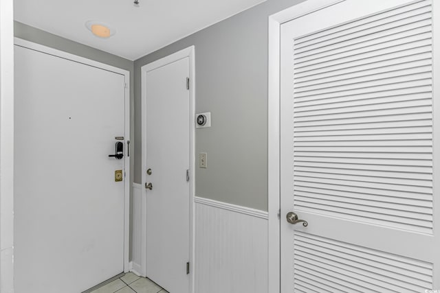 5905 S Kings Hwy Unit 1816Rt, Myrtle Beach, SC 29575 - entryway with light tile patterned flooring and a wainscoted wall
