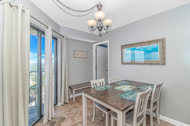 5905 S Kings Hwy Unit 1816Rt, Myrtle Beach, SC 29575 - dining space with a chandelier, baseboards, and light tile patterned flooring
