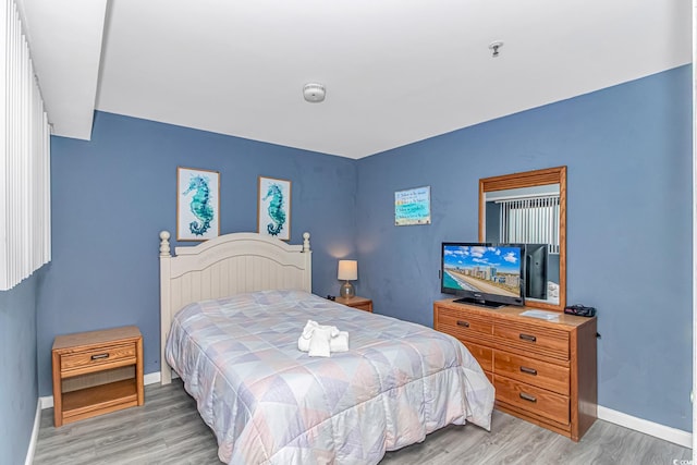 5905 S Kings Hwy Unit 1816Rt, Myrtle Beach, SC 29575 - bedroom featuring light wood-style flooring and baseboards