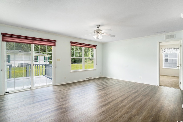 1001 Greencrest Ct, Conway, SC 29526 - unfurnished room featuring a ceiling fan, wood finished floors, crown molding, and baseboards