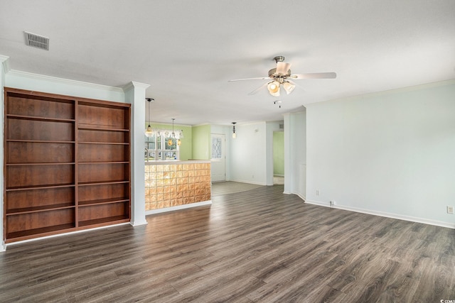 1001 Greencrest Ct, Conway, SC 29526 - unfurnished living room with ornamental molding, ceiling fan, dark wood finished floors, baseboards, and a chandelier