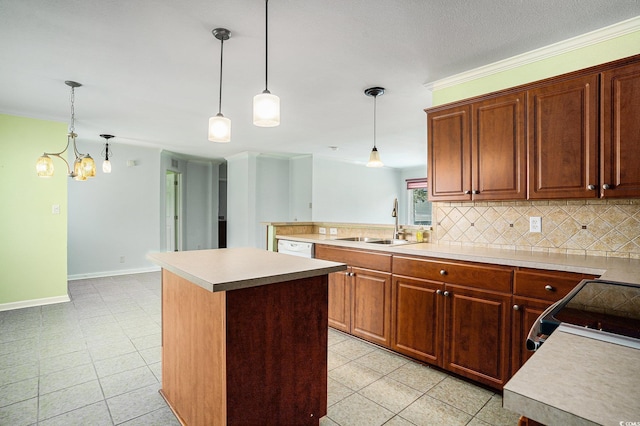 1001 Greencrest Ct, Conway, SC 29526 - kitchen featuring a sink, range with electric cooktop, backsplash, light countertops, and a center island