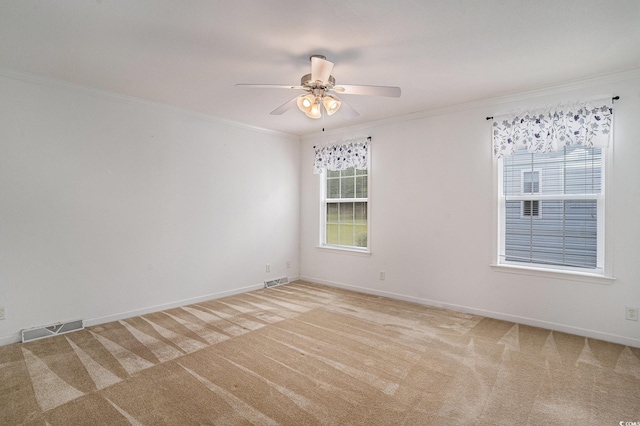 1001 Greencrest Ct, Conway, SC 29526 - spare room with crown molding, carpet, a ceiling fan, and baseboards