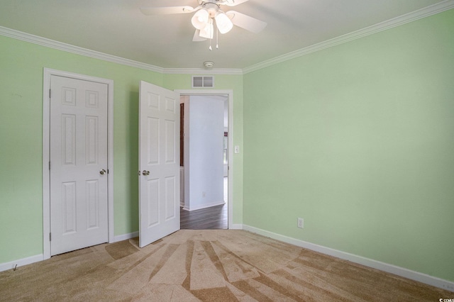 1001 Greencrest Ct, Conway, SC 29526 - unfurnished bedroom featuring ornamental molding, baseboards, carpet, and a ceiling fan