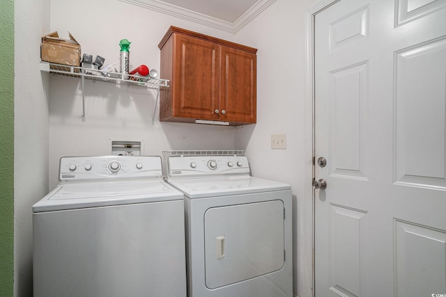 1001 Greencrest Ct, Conway, SC 29526 - laundry room with washer and clothes dryer, ornamental molding, and cabinet space