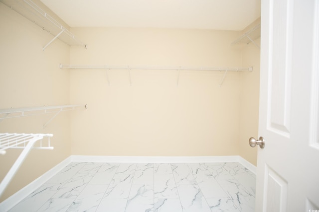112 Molinia Dr, Murrells Inlet, SC 29576 - spacious closet with marble look tile flooring