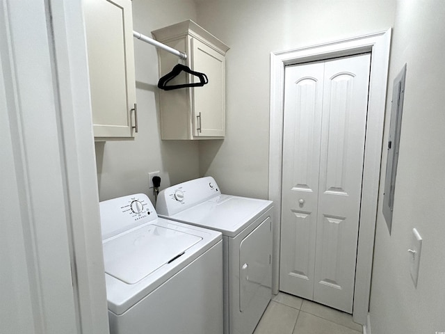 1029 Ray Costin Way Unit 909, Murrells Inlet, SC 29576 - laundry room with cabinet space, washer and clothes dryer, and light tile patterned floors