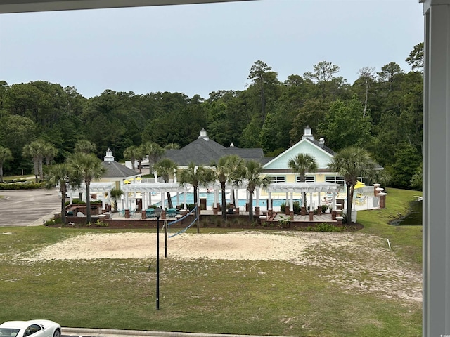 1029 Ray Costin Way Unit 909, Murrells Inlet, SC 29576 - view of property's community featuring volleyball court, a forest view, and a lawn