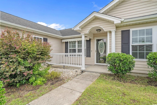 1220 Dunraven Ct, Conway, SC 29527 - doorway to property with covered porch and a shingled roof
