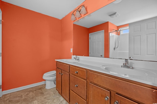 1220 Dunraven Ct, Conway, SC 29527 - full bath featuring baseboards, toilet, double vanity, and a shower