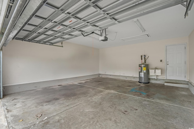 1220 Dunraven Ct, Conway, SC 29527 - garage with electric water heater, a garage door opener, and a sink