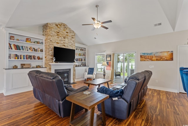 131 Crabapple Dr, Longs, SC 29568 - living room featuring a ceiling fan, vaulted ceiling, wood finished floors, built in features, and a large fireplace