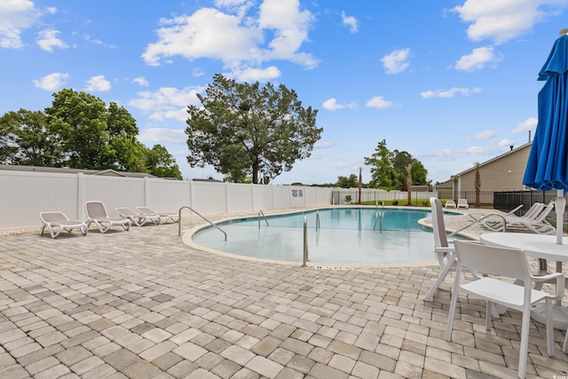 131 Crabapple Dr, Longs, SC 29568 - community pool with a patio