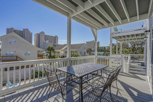 1613 Havens Dr, North Myrtle Beach, SC 29582 - deck with outdoor dining area