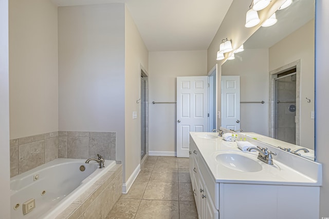 1613 Havens Dr, North Myrtle Beach, SC 29582 - full bathroom featuring a jetted tub, a shower stall, double vanity, and tile patterned floors