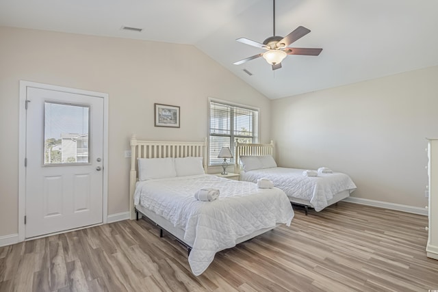 1613 Havens Dr, North Myrtle Beach, SC 29582 - bedroom featuring light wood-style flooring, baseboards, high vaulted ceiling, and ceiling fan