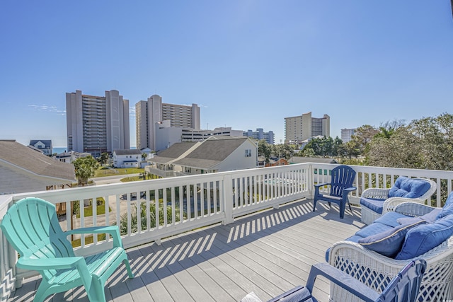 1613 Havens Dr, North Myrtle Beach, SC 29582 - wooden terrace featuring a city view