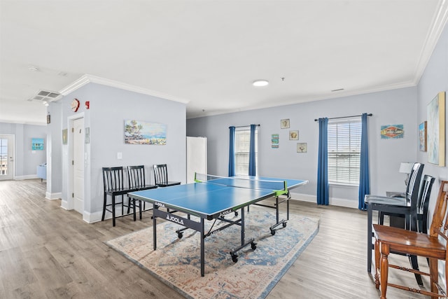 400 Hillside Dr S, North Myrtle Beach, SC 29582 - playroom with crown molding, plenty of natural light, baseboards, and light wood-style floors