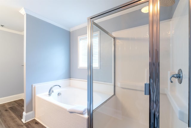 400 Hillside Dr S, North Myrtle Beach, SC 29582 - bathroom featuring a stall shower, crown molding, a garden tub, wood finished floors, and baseboards