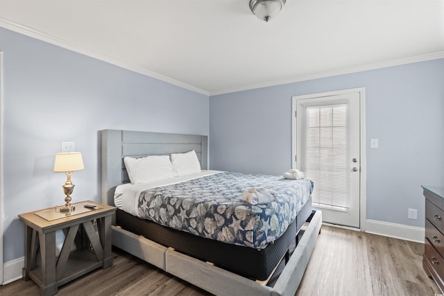 400 Hillside Dr S, North Myrtle Beach, SC 29582 - bedroom featuring crown molding, wood finished floors, and baseboards