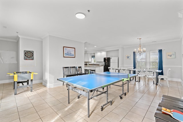 400 Hillside Dr S, North Myrtle Beach, SC 29582 - recreation room featuring light tile patterned flooring, crown molding, a chandelier, and baseboards